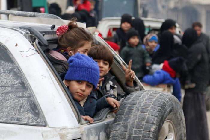 Children Sit In A Car As They Wait To Be Evacuated From A Rebel Held Sector Of Eastern Aleppo